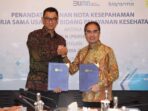Penandatanganan Memorandum of Understanding (MoU) antara Direktur Utama Holding BUMN Farmasi Honesti Basyir dan Direktur Utama PLN Darmawan Prasodjo di Jakarta, Jumat (19/5). Foto: PLN.